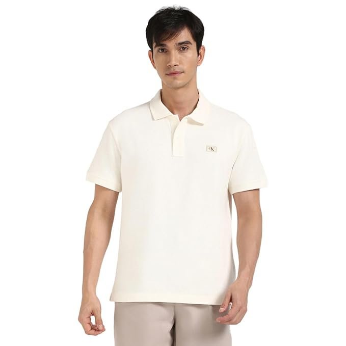 36-5.jpg Calvin Klein Jeans Men's Solid Relaxed Fit Polo Shirt - Image 1